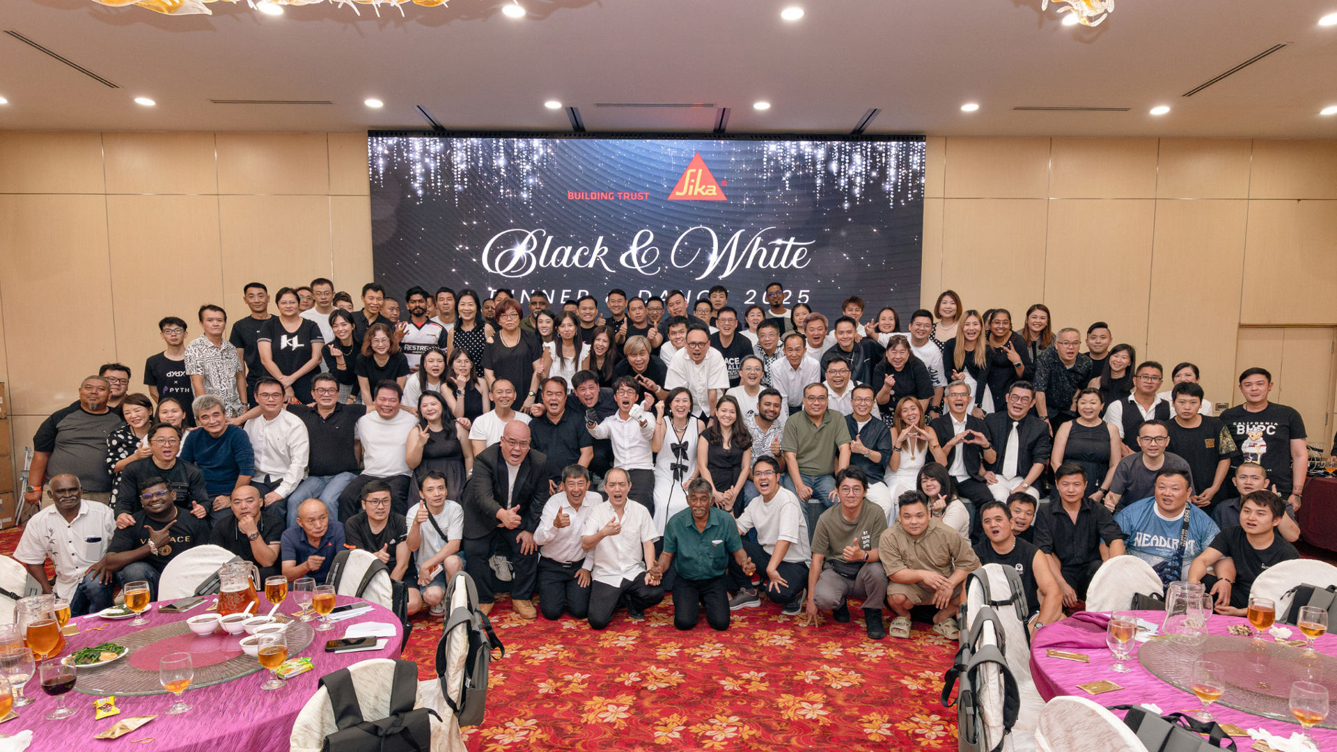 Large group photo at Black & White event conference