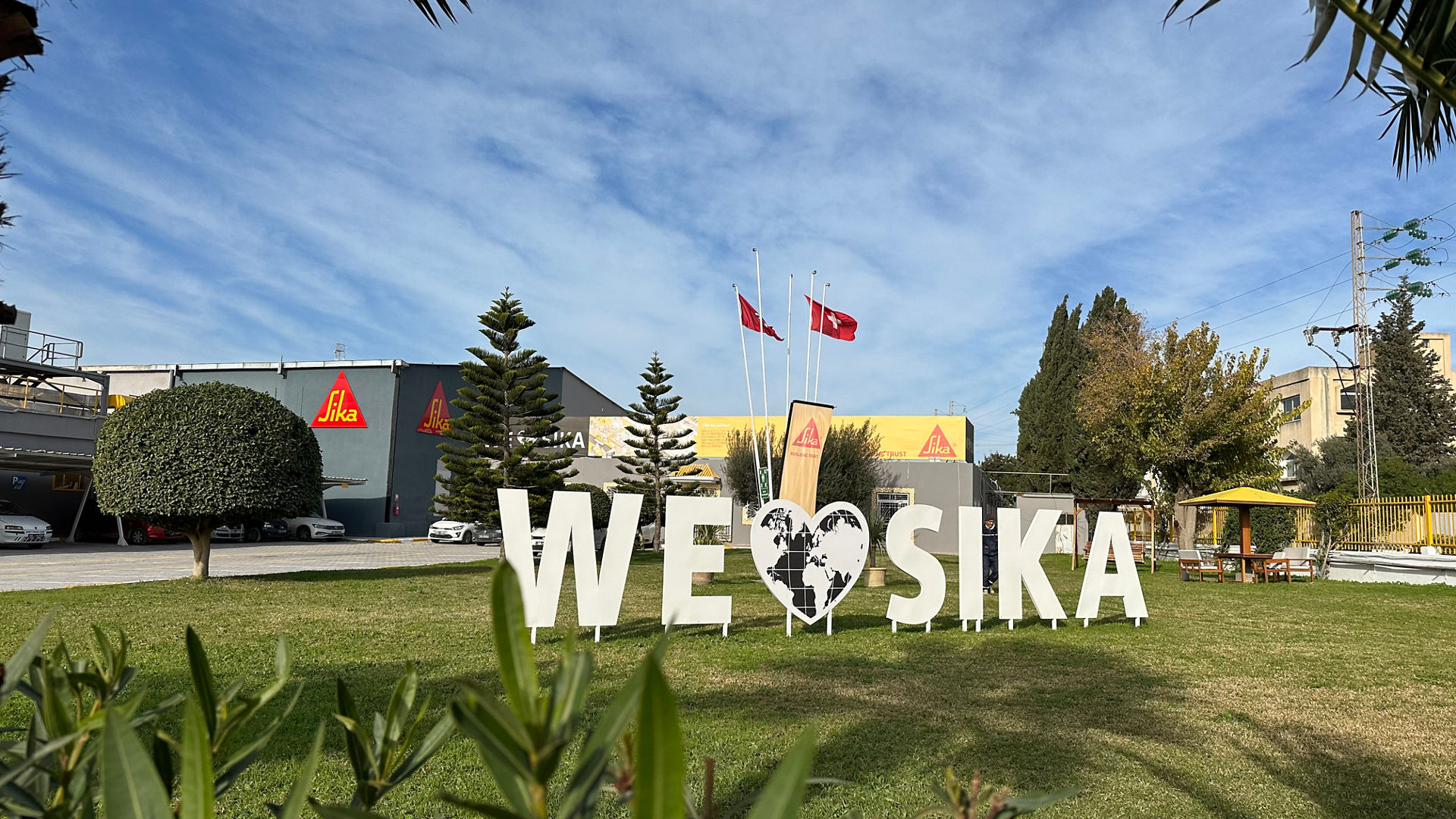 Sika facility with 'We Love Sika' sign