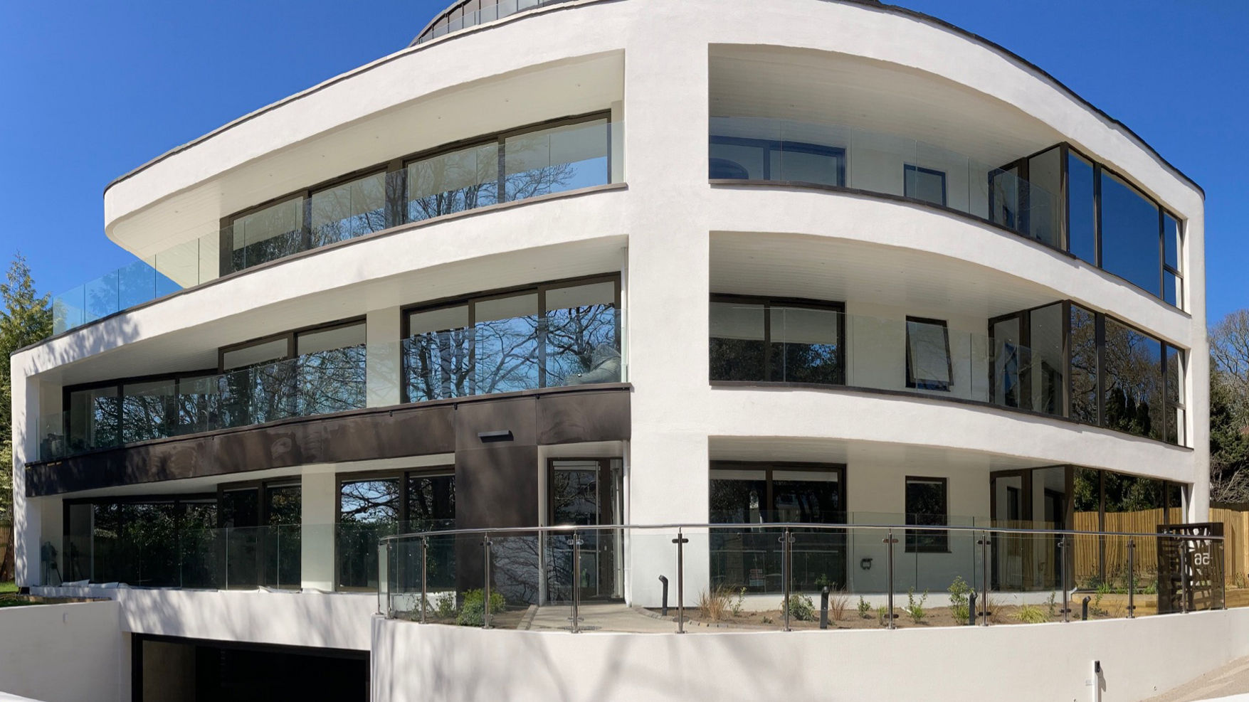 Modern white building with curved design
