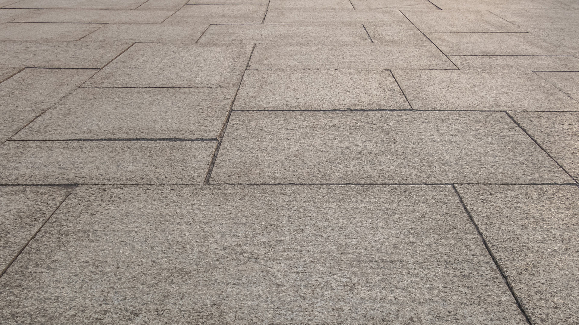 Geometric Pattern of Outdoor Stone Pavement Tiles