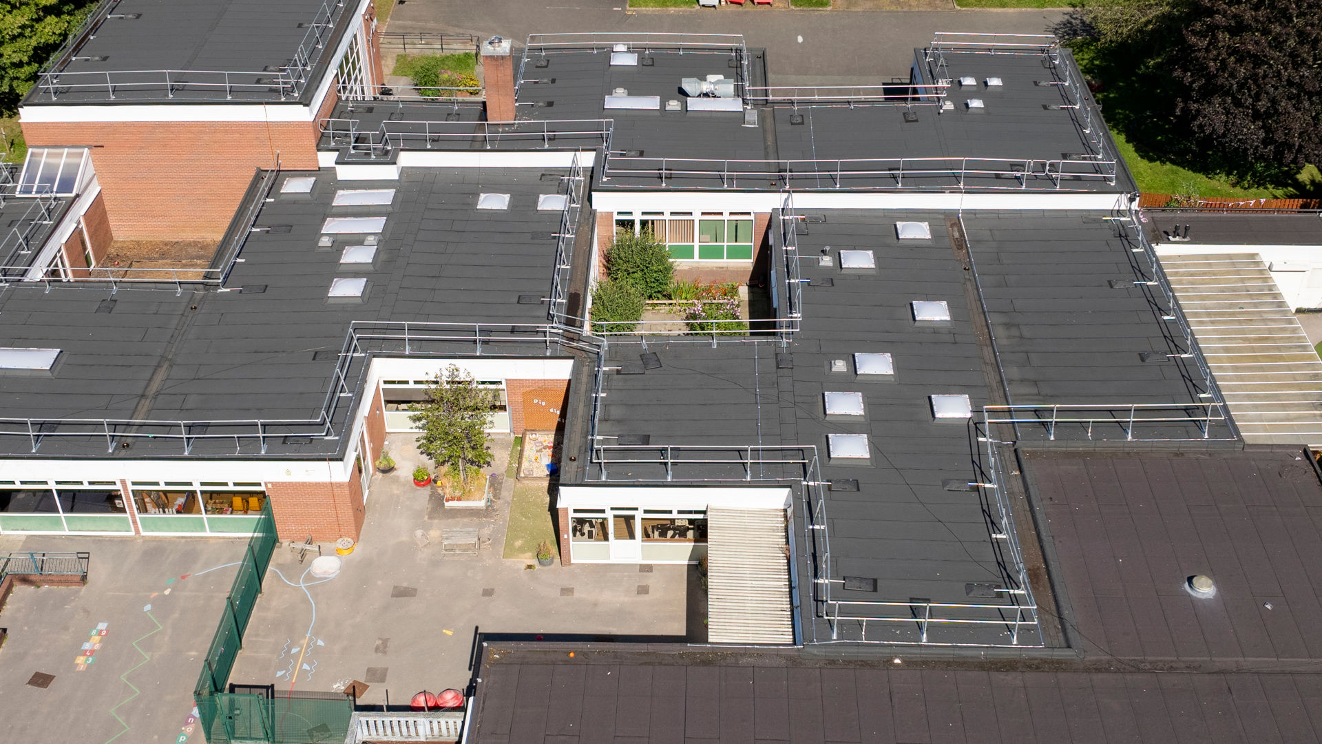 Aerial view of modern school building complex