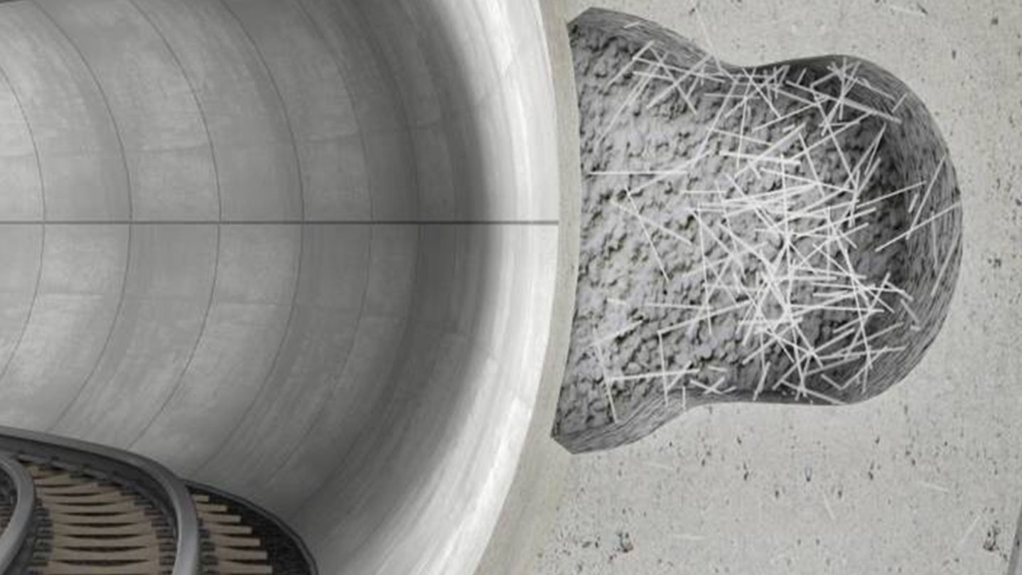 Concrete tunnel cross-section with exposed reinforcement