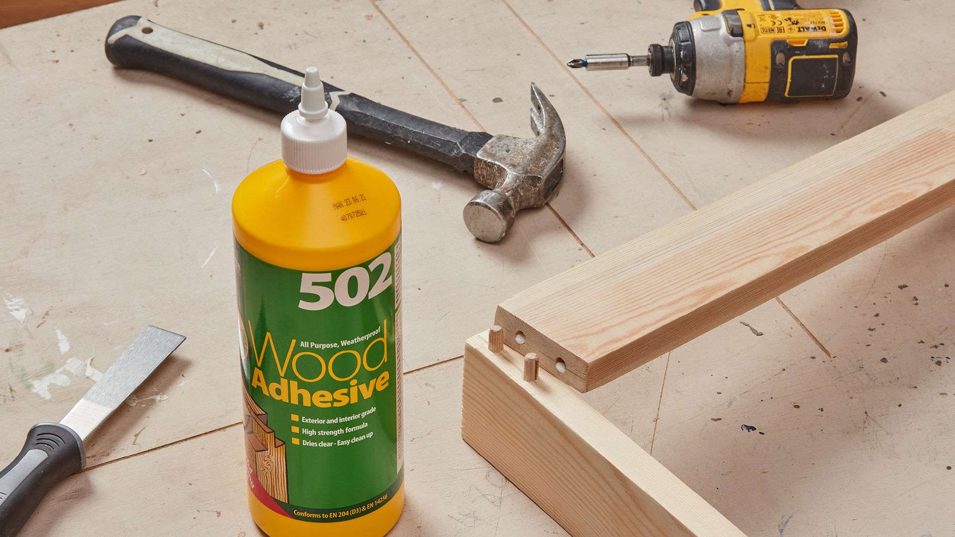 502 Wood Adhesive on work bench