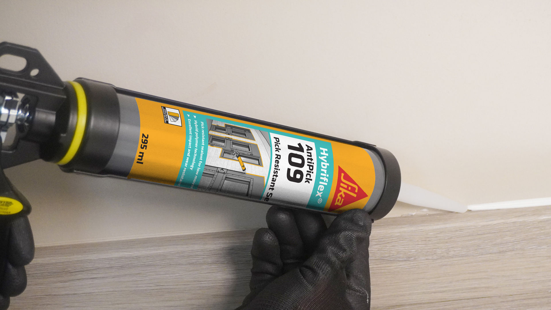 Person applying Sika Hybriflex Anti Pick 109