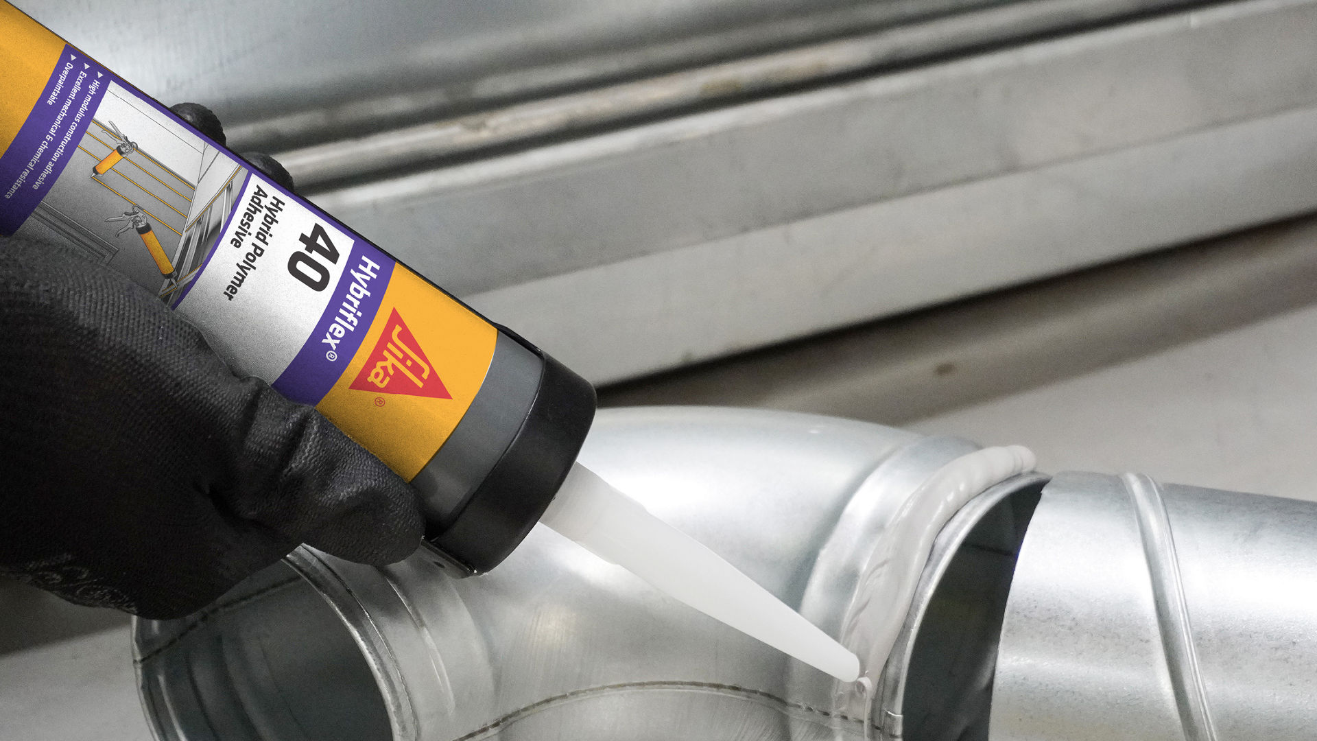 Person applying Sika Hybriflex 40