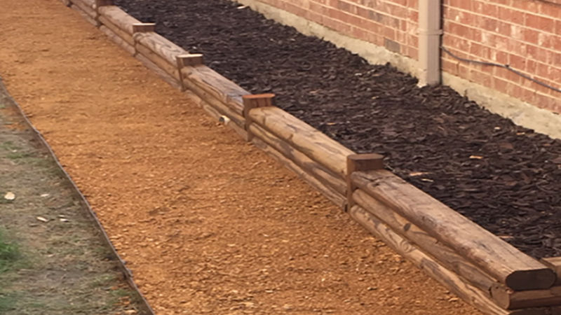 DIY Landscape Timber Retaining Wall Project