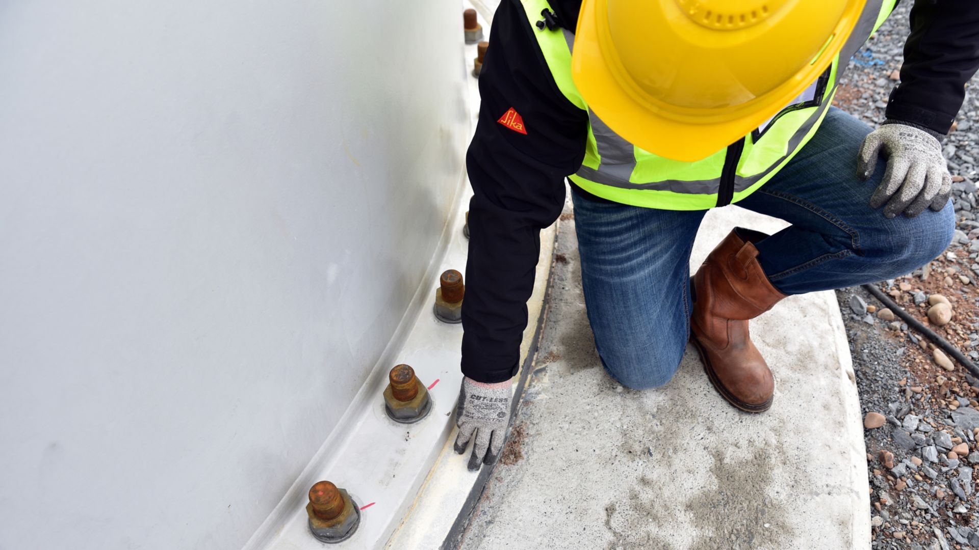 Man checking grouting quality 